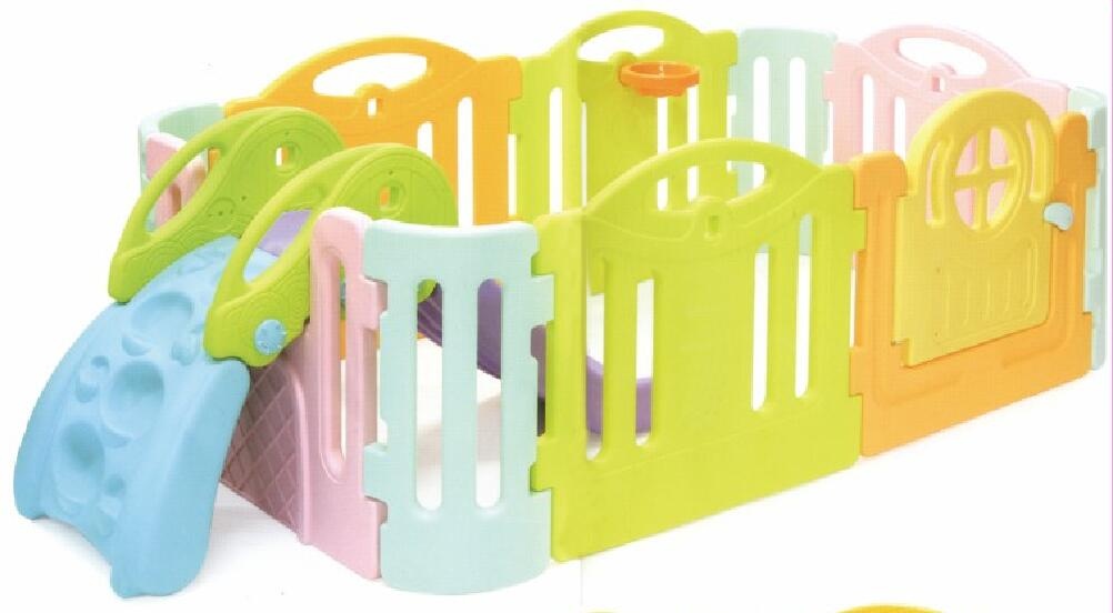 toddlers plastic slide with fence in home